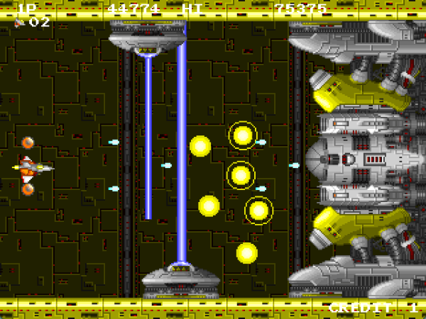 Player facing off against an enormous yellow boss in INFINOS that is trapping the player in with laser beams and shooting yellow orbs of electricity