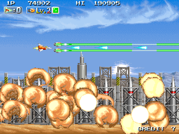 Player flying past a factory exploding underneath in INFINOS GAIDEN