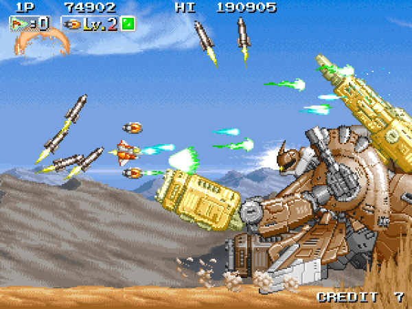Player battling a huge sand-colored mech in a desert in INFINOS GAIDEN