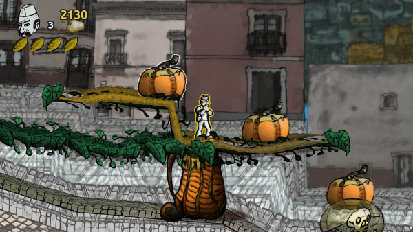 The baker standing on a platform made of giant orange gourds and vines